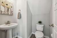 Half bath/ Powder room conveniently located on the Main level.