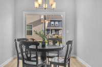 Dining Area Located off the Kitchen, Swift Access to Back Patio area with Sliding Glass Door!