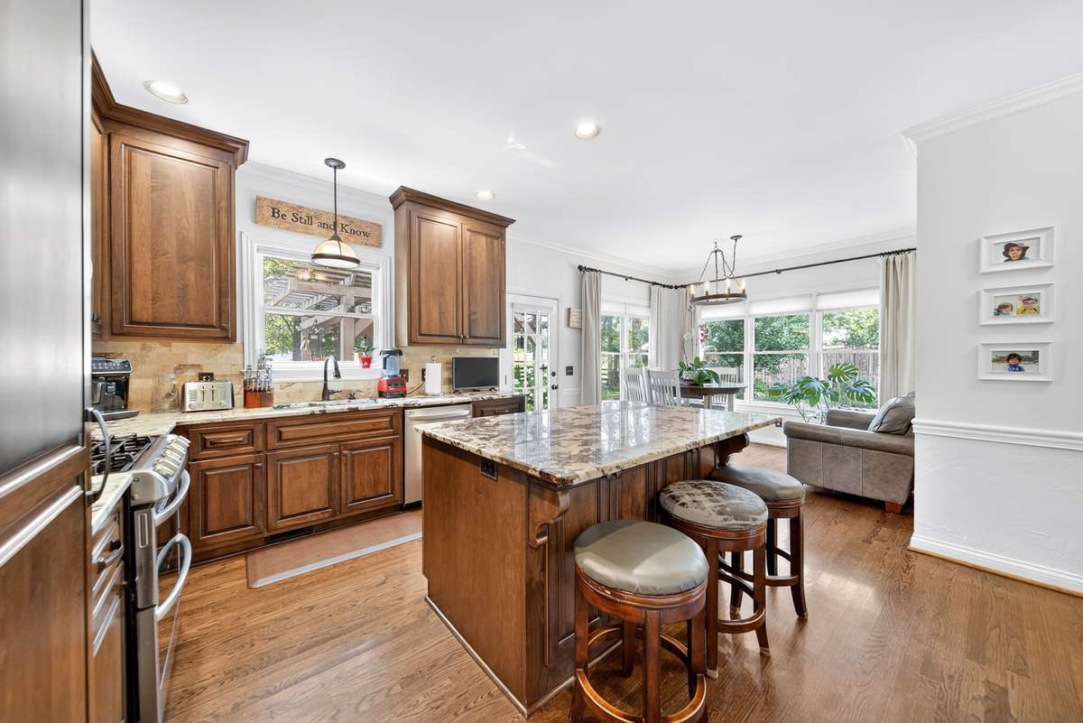 The warm wood tones bring natural elegance to this kitchen.