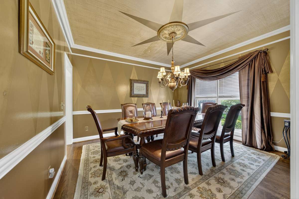 Sophisticated ambiance with star ceiling and large window for natural lighting.