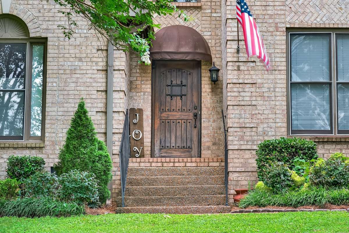 This gorgeous front door is solid mahogany and came from South America.