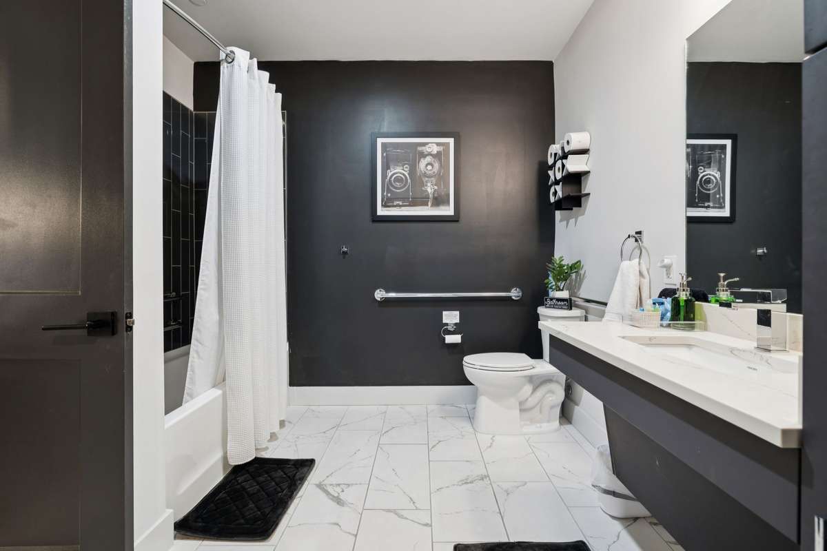 Luxury bathroom with handicap accessible sink.