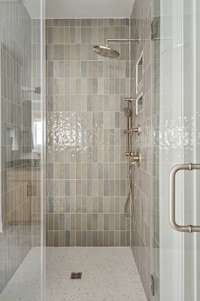 Oversize shower in lieu of tub/shower combo.