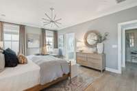 Primary Bedroom has ensuite to the left and Laundry hall to the right.