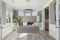 Staged Office or can be a dining room. Actual home does not have french door to pantry. Lighting and colors are represented in Design boards in Picture gallery.