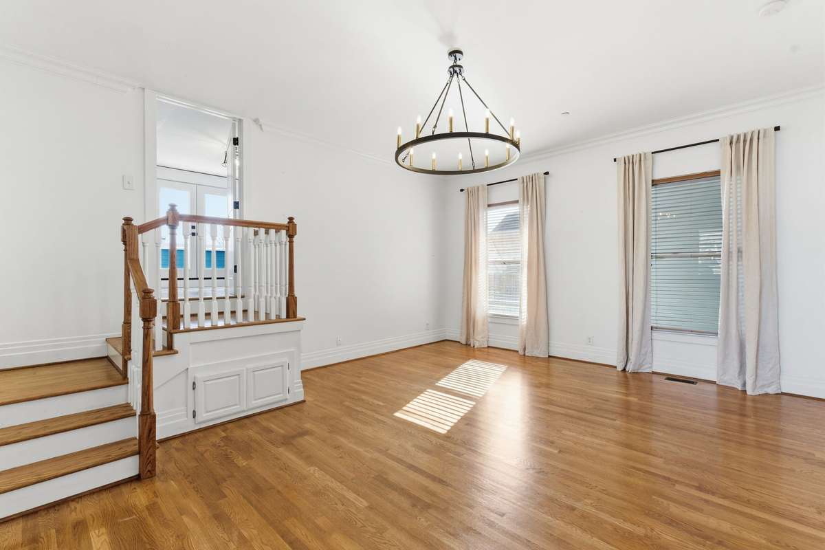 Primary Suite on main level with access to flex space.