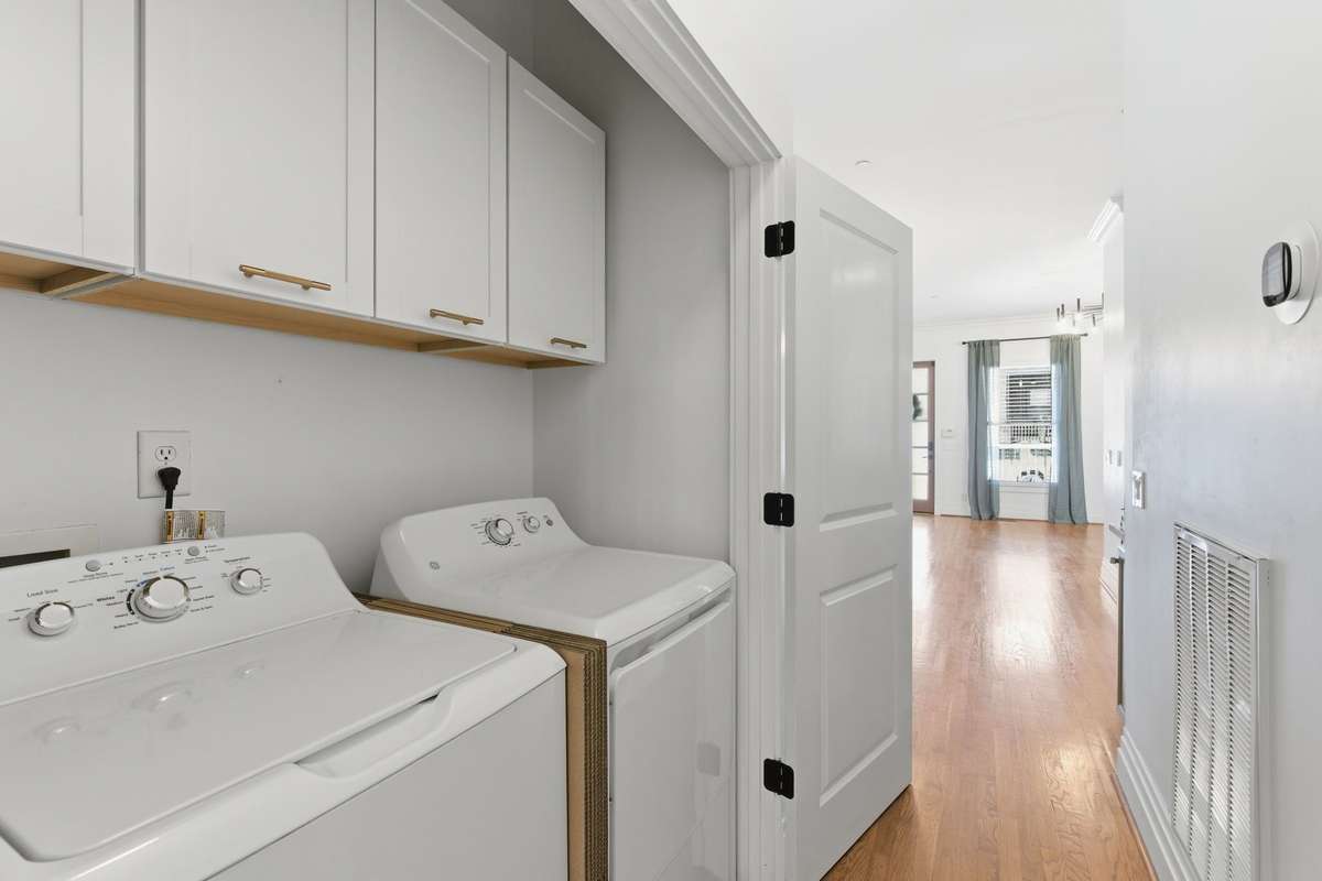 W+D on main, steps from Primary Bedroom!