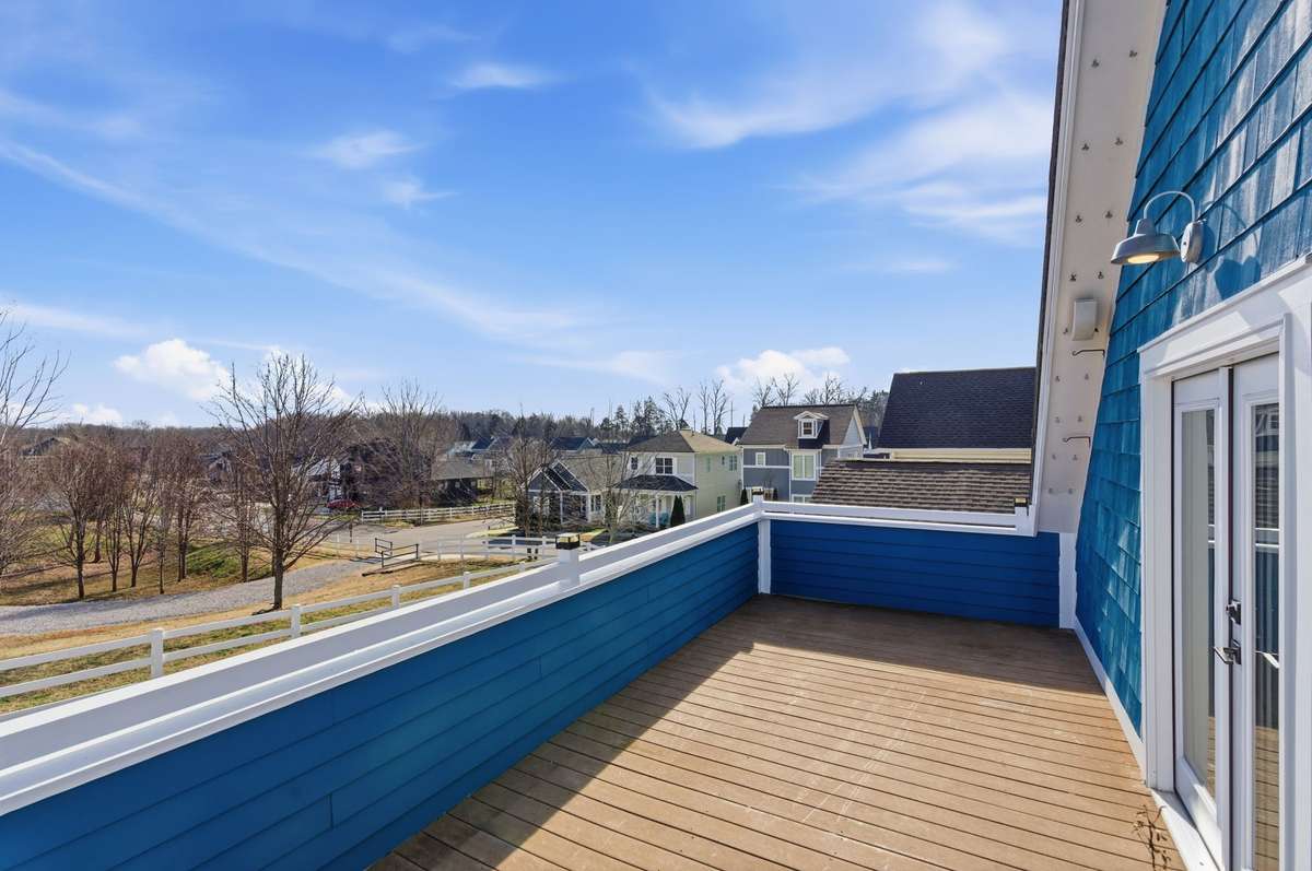 Private balcony with views overlooking the community amphitheater and common areas.