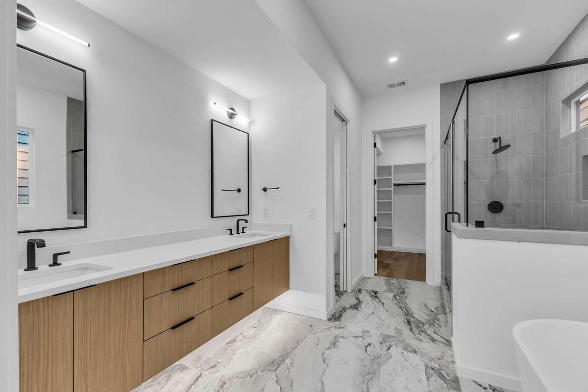 Elegant Modern Bath with striking floor tile and floating double vanity