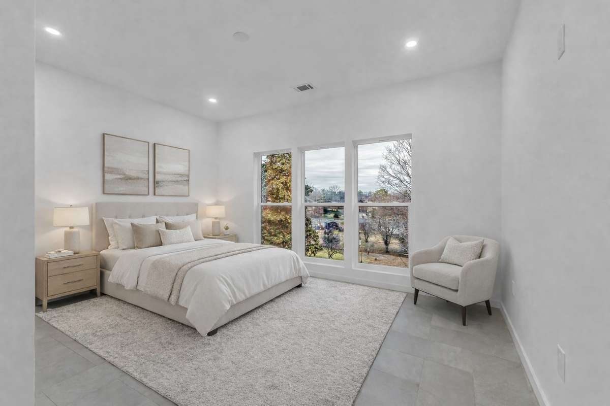 1 of 2 Basement Bedrooms with en suite bath (Bedroom 5 with digital staging)