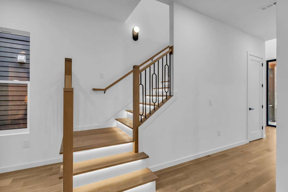 Impressive illuminated stair treads to the second floor