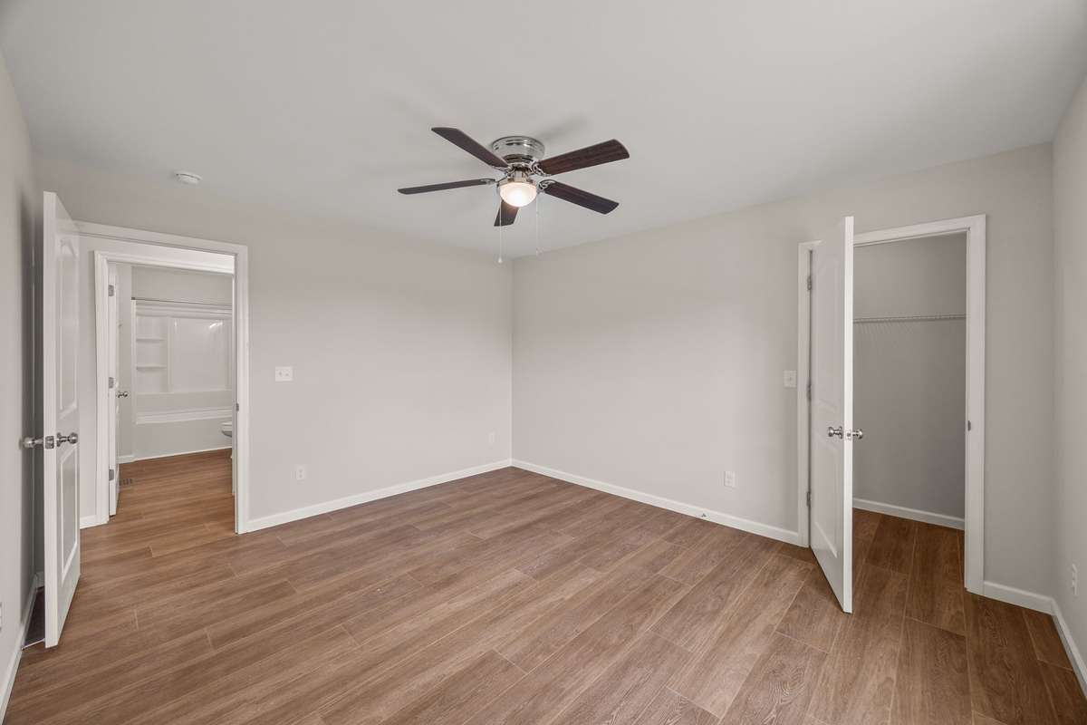 Bedroom #2 is large with a front yard/front ridge view, ceiling fan, and oversized closet!