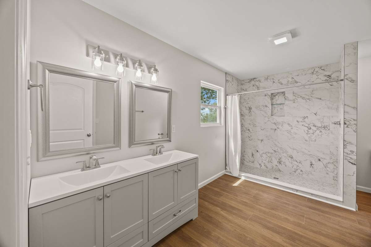 Isn't this bathroom amazing?! There is so much space to get ready in the mornings, a spacious room for privacy and taking a hot shower! There is also a linen closet in the bathroom.