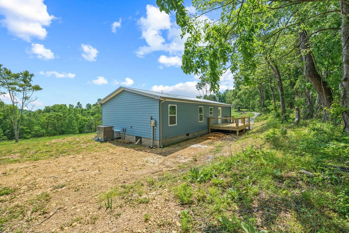 With such a huge yard on the right and left side of the home, the options to build up your homestead are endless!
