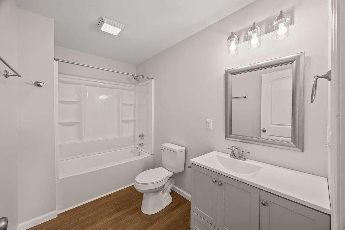 The 2nd full bathroom (hallway bathroom) has a shower/tub combo with convenient shelving and a spacious vanity with lots of storage and counterspace to set all your toiletries!