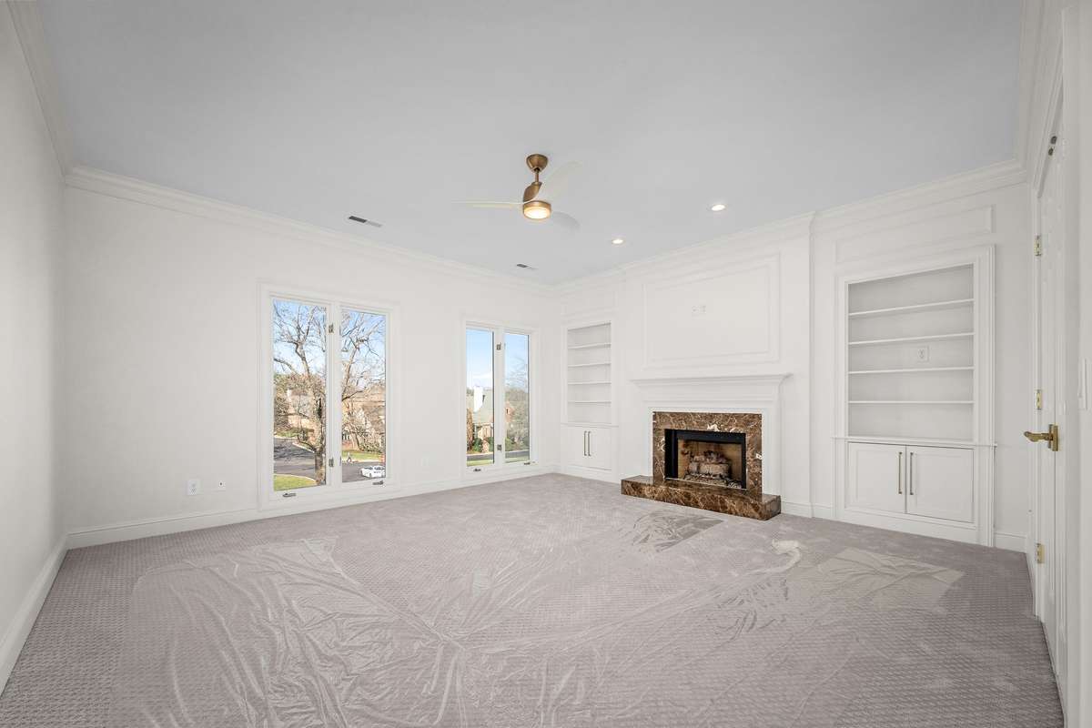 Top Level - Bedroom #3
with Gas Fireplace & Custom Built-Ins