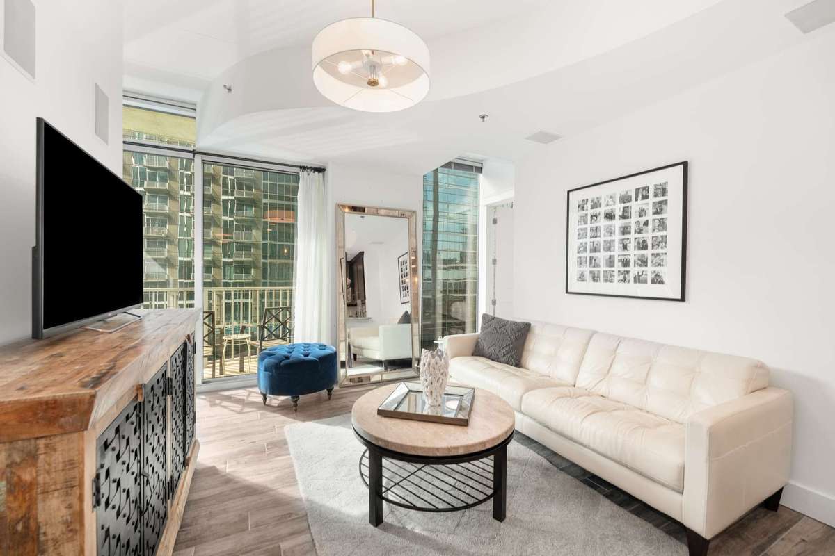 Floor to ceiling glass ensure the living space is bright and filled with natural light.