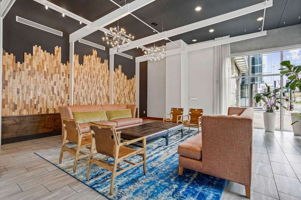 Handsomly appointed lobby furnishings with wrap around views of your downtown surroundings