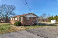 A view from the Driveway, with Storage Building in the distance.