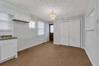The Kitchen and Dining area.  In the distance are the folding doors that enter into the Laundry Room.