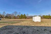 This home offer a large lot (.96 of an acre) and the Storage Building remains.