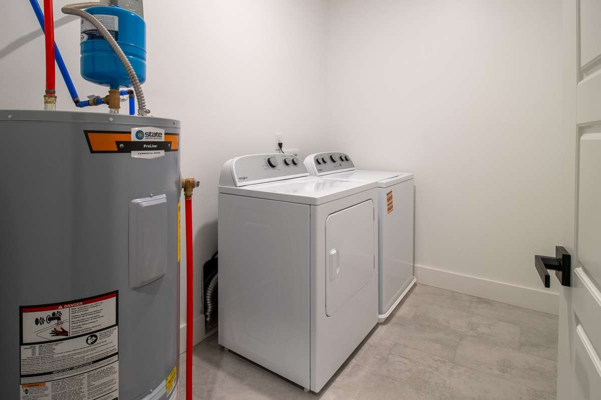 Conveniently located on the same level as the bedrooms, the laundry room comes equipped WITH WASHER AND DRYER!