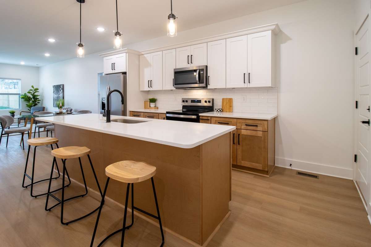 A full stainless steel appliance package (along with a fridge!) is included.