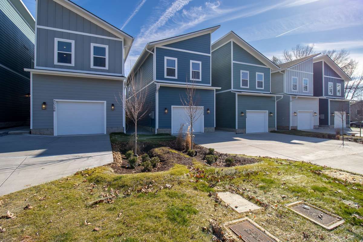 Welcome to 4028 B University Ave (far right, teal home), one of 6 new construction homes in the heart of Old Hickory!