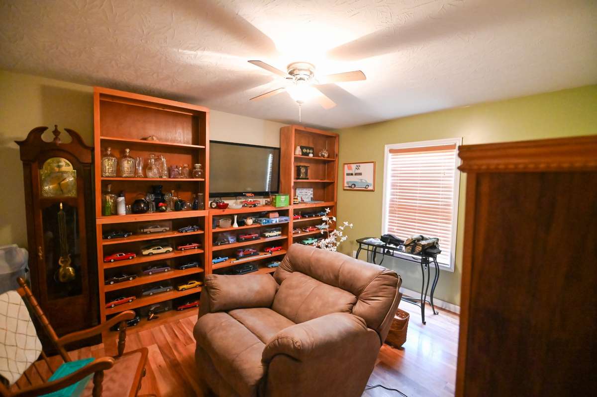 One of the guest rooms being currently being used as a den.
