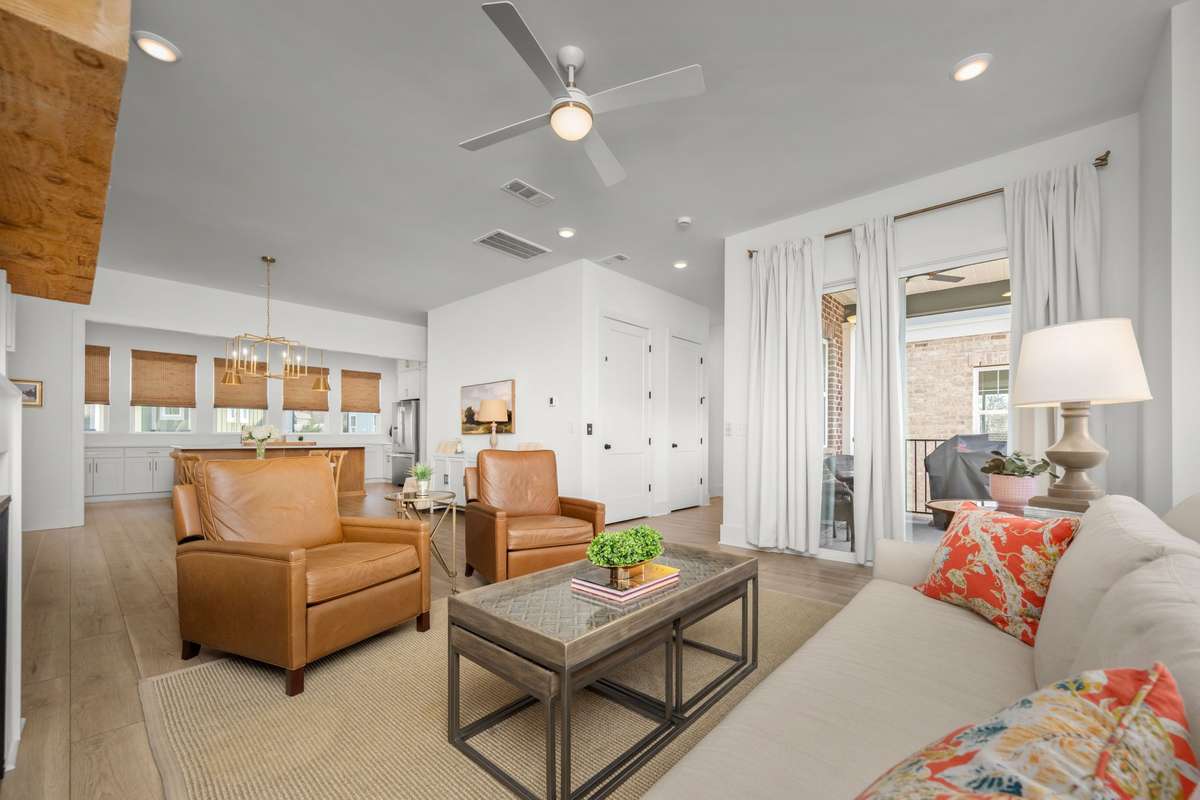 Inviting living room with gas fireplace and balcony access!