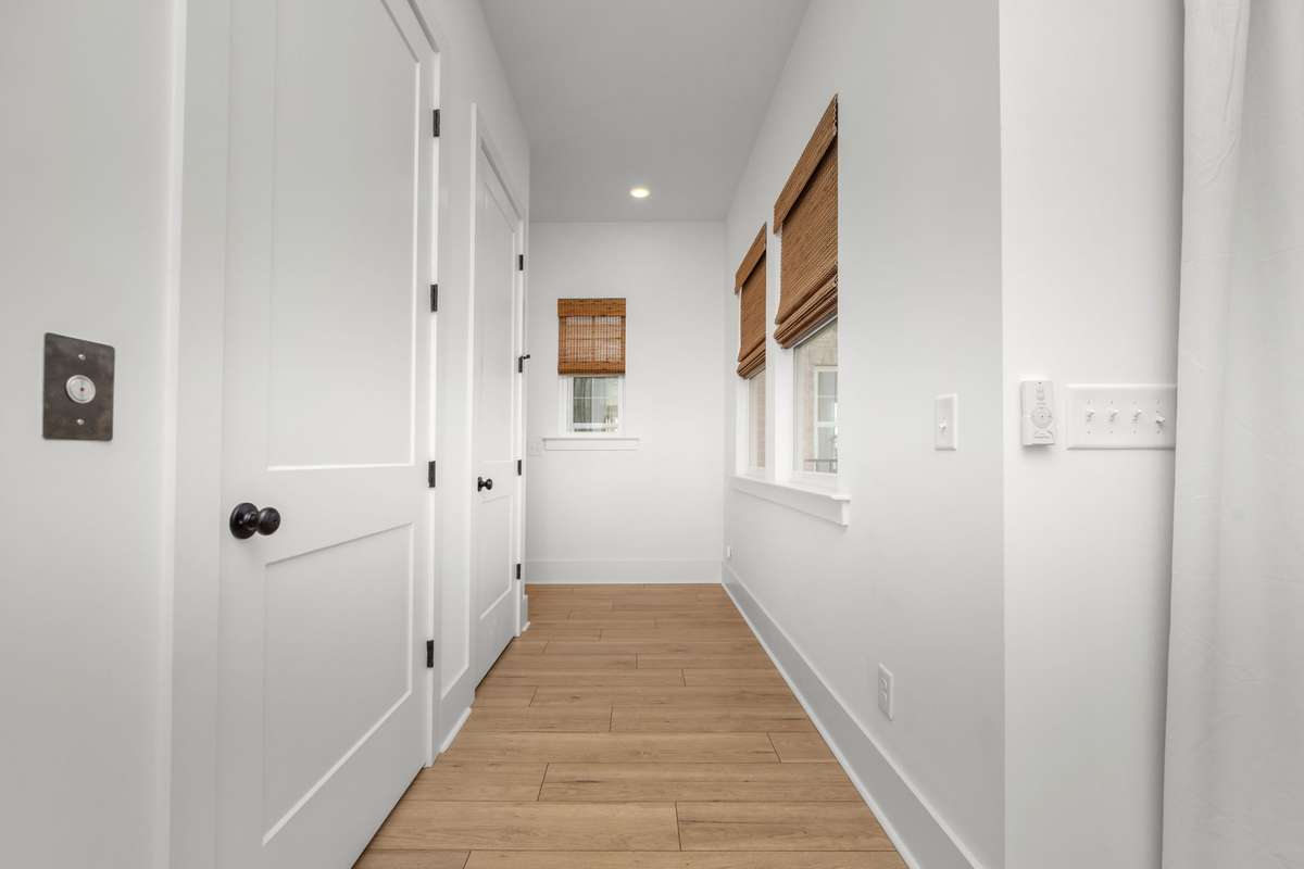 Hall on 3rd level featuring the elevator and storage closet