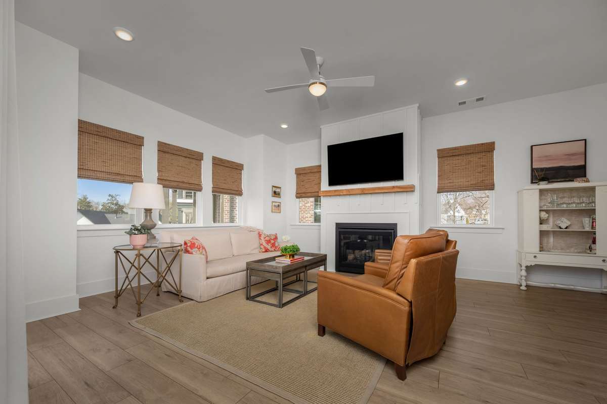 Inviting living room with gas fireplace and balcony access!