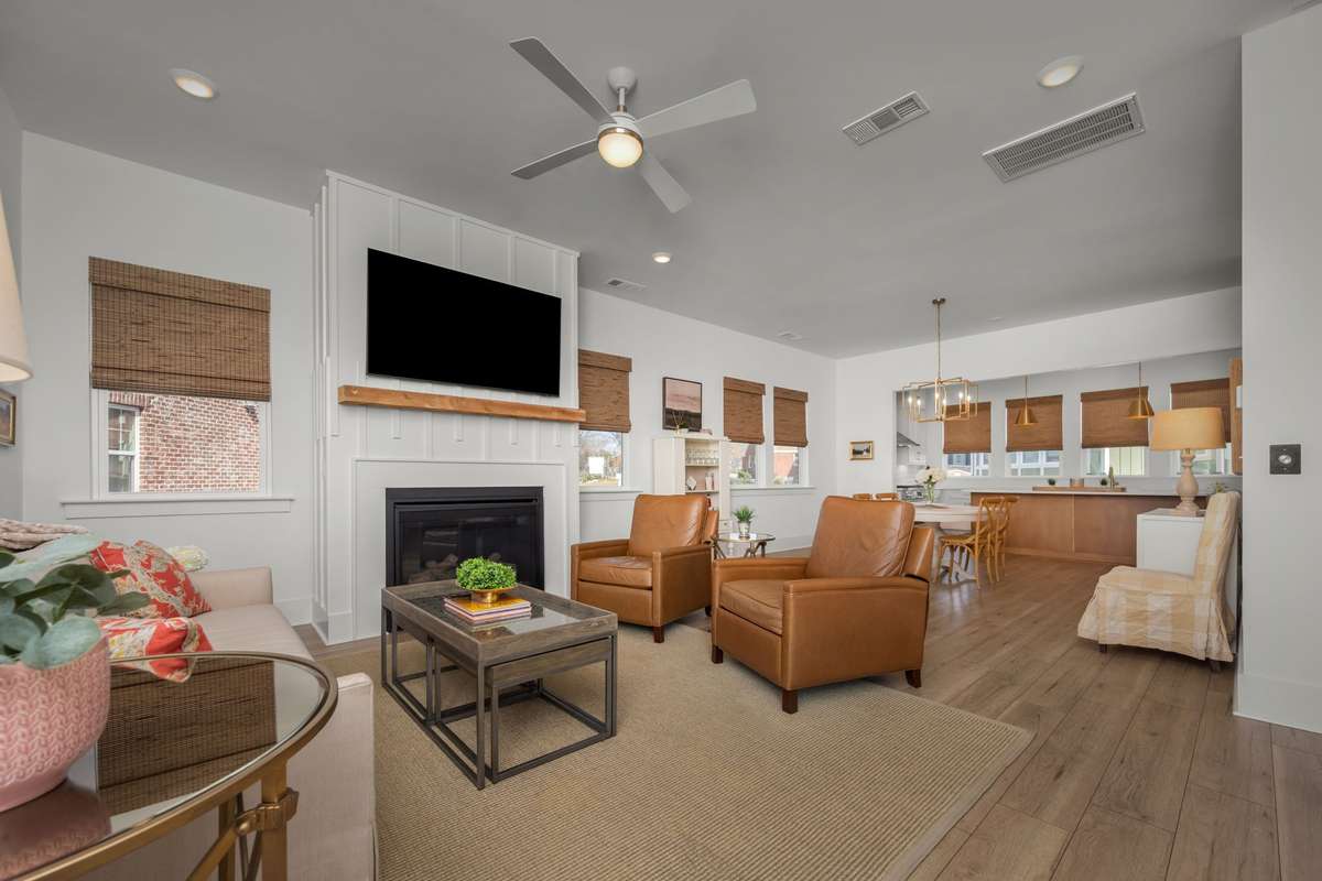 Inviting living room with gas fireplace and balcony access!