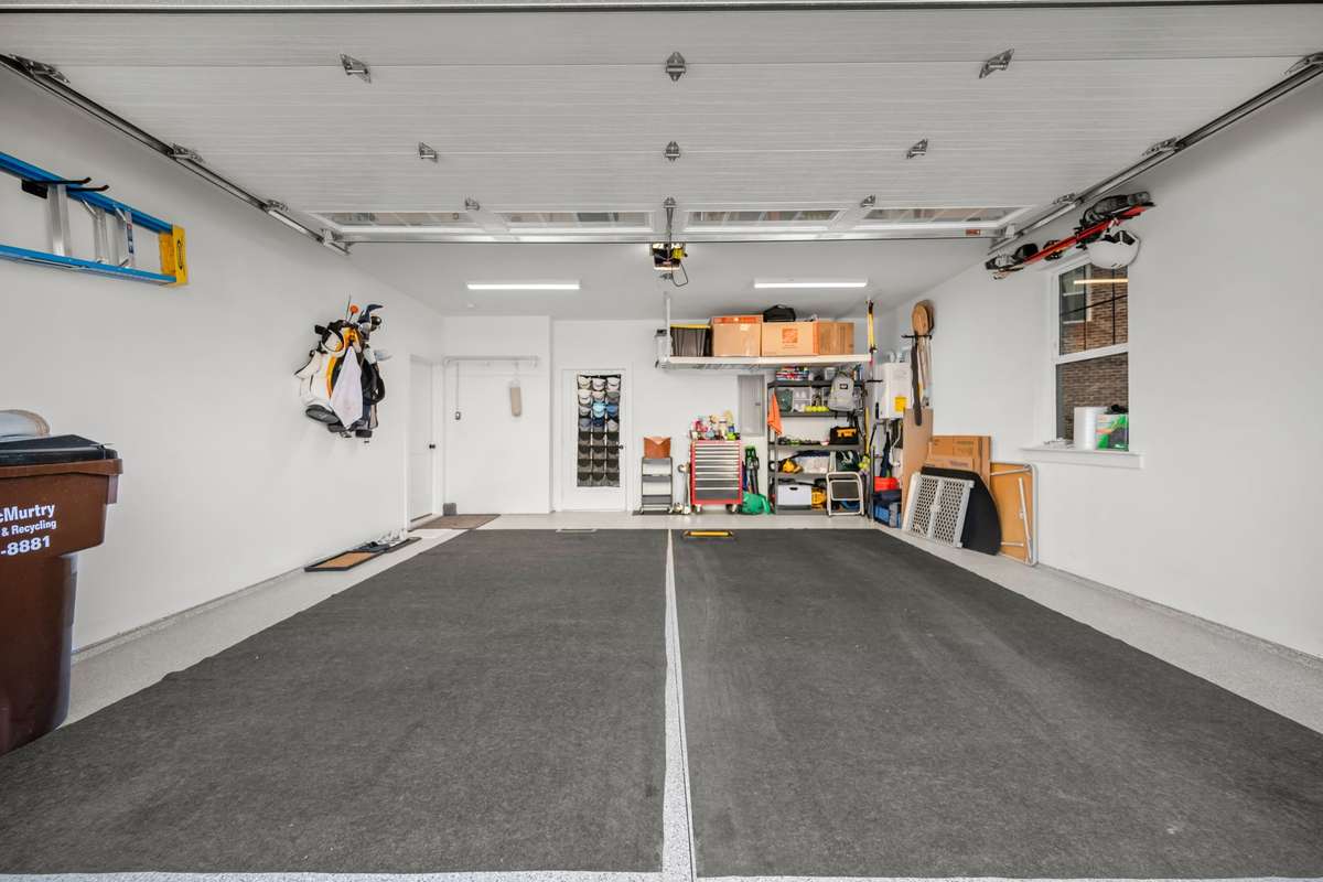 Garage with shelving and epoxy floors!