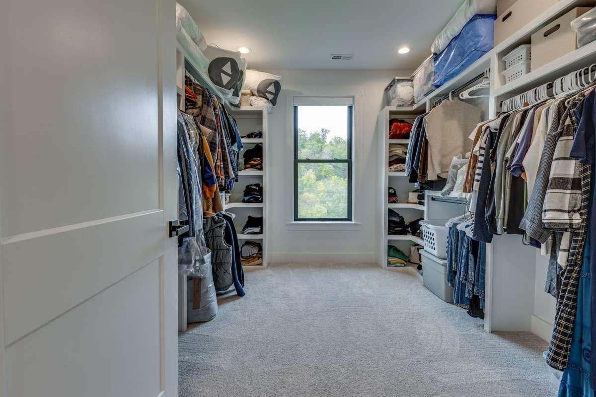 Oversized walk-in  primary closet.