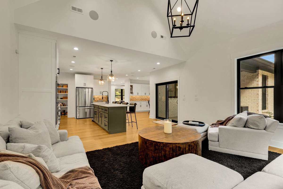 Den open to the huge Kitchen.