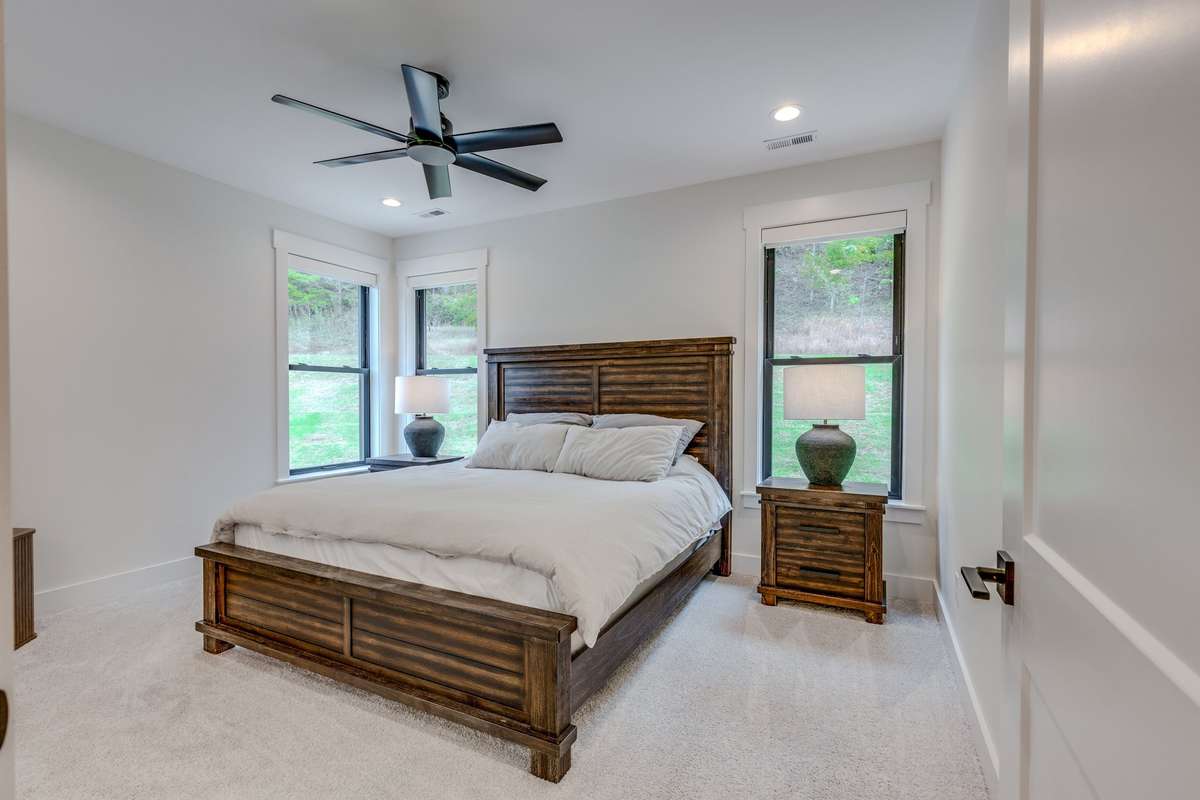 Primary Bedroom on the main level with its own Privete Bath and walk-in closet.
