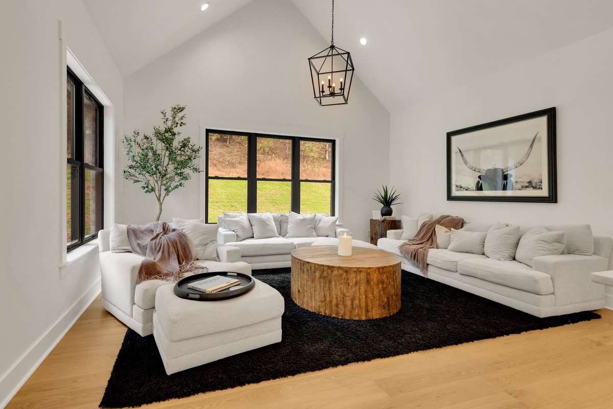 Huge Den area over looking private backyard area.