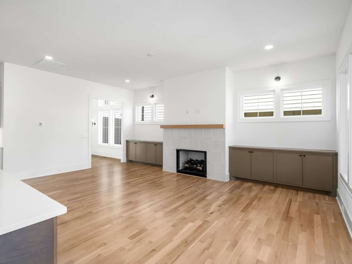 built-in cabinets and designer sconces finish this room off perfectly!