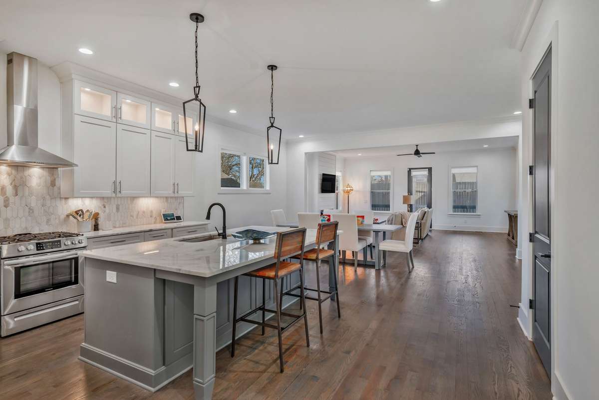 The Heart of your Home this Open Concept Kitchen, Dining, Great Room flow back to the Screened Porch and Backyard Yard