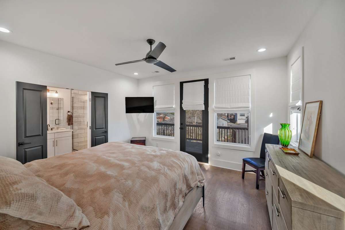 Primary Suite has a Private Deck Overlooking the Backyard