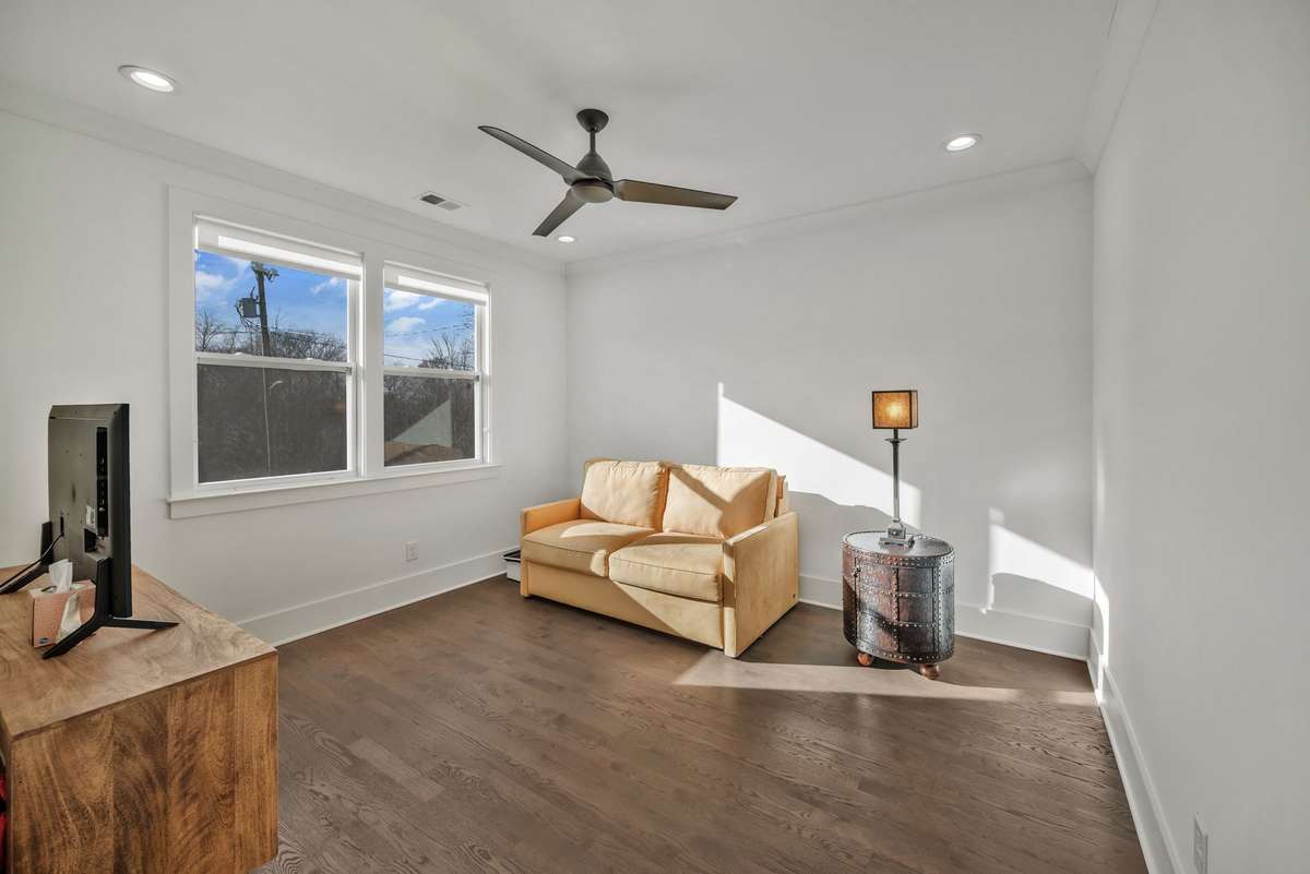 Upstairs Den/RecRm tucked away at the end of the upstairs hallway w additional storage