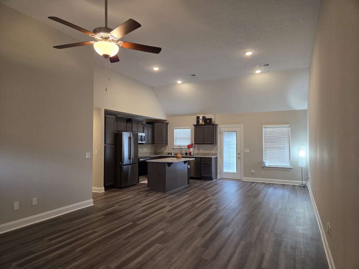 Living Room is open to Kitchen and Dining Area.