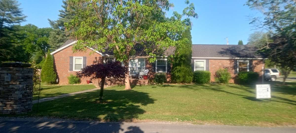 The lovely front yard in this stable neighborhood.