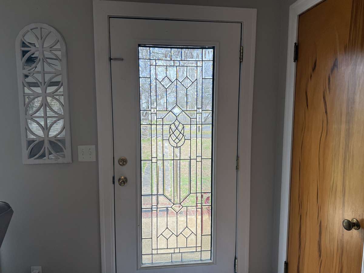 Beautiful front door welcomes you and guests home.