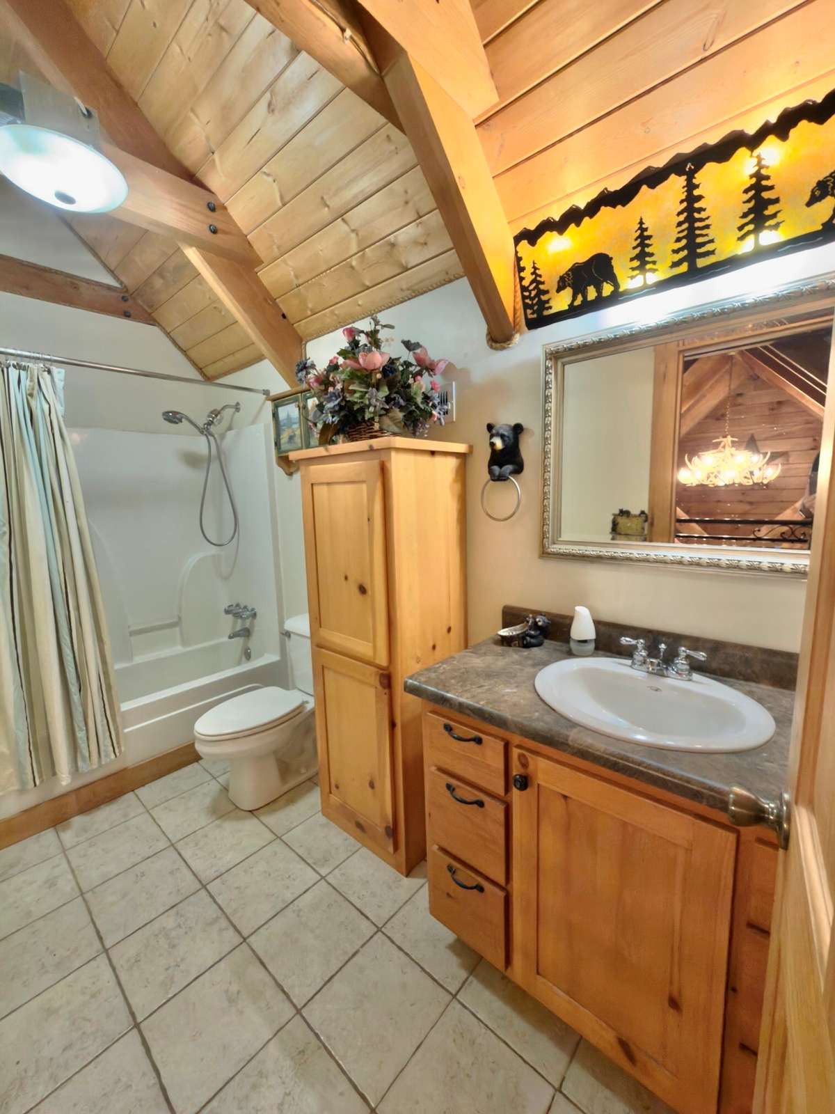 Upstairs full bath with tub/shower combination.