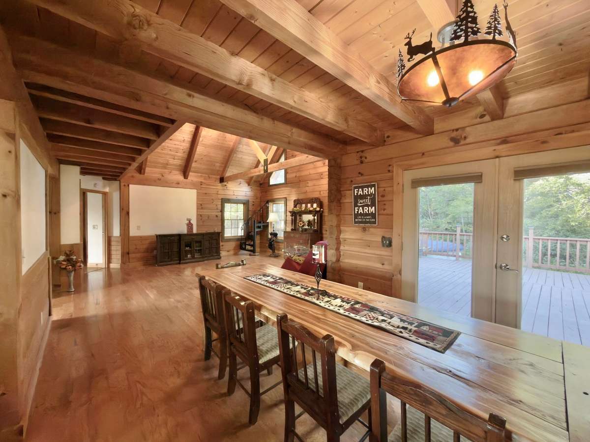 Separate dining area with french door access to the deck.