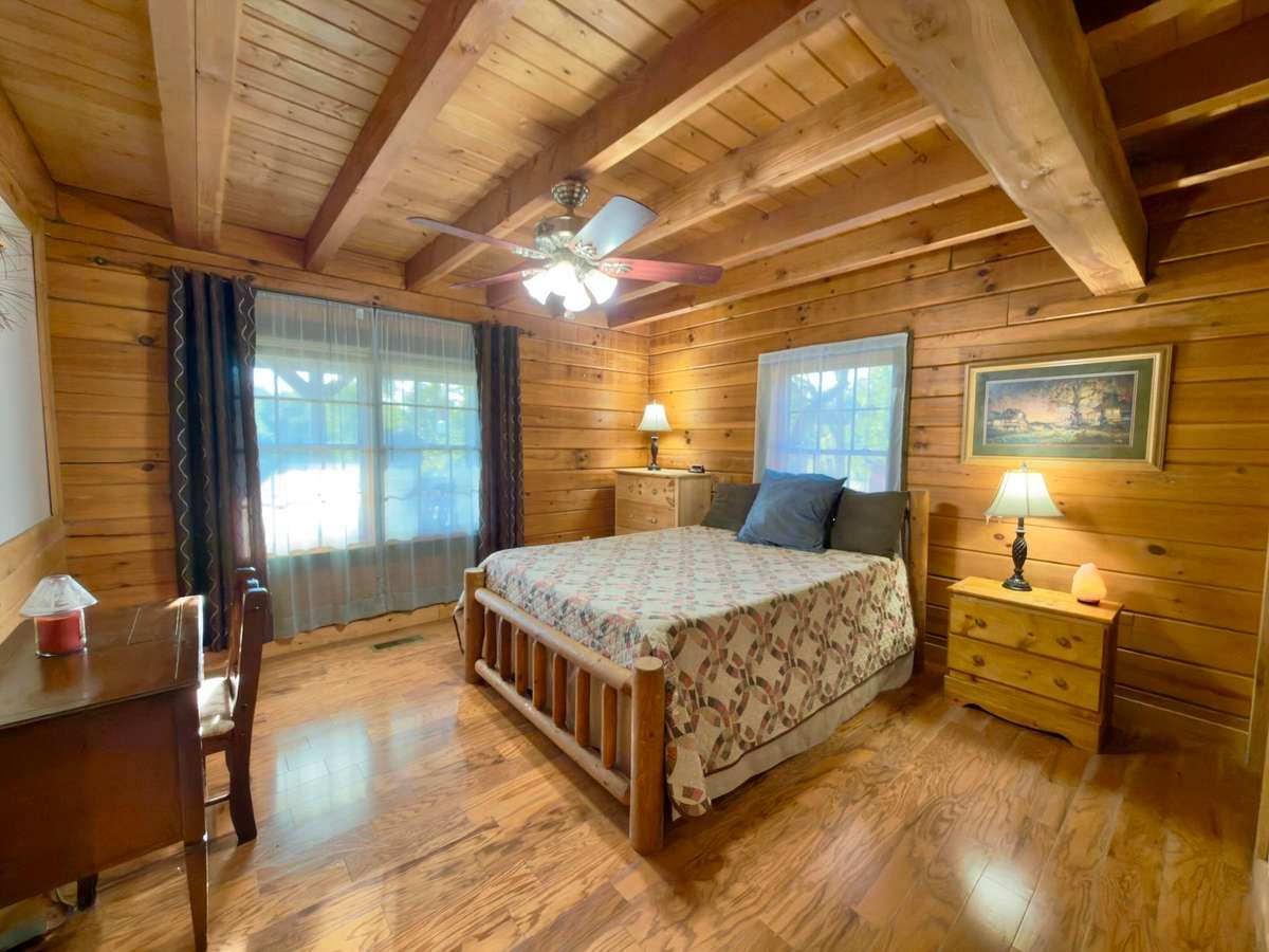 Primary bedroom measures 13x13 with walk-in closet and full bath with tub/shower combination. Primary bedroom is on the main level.