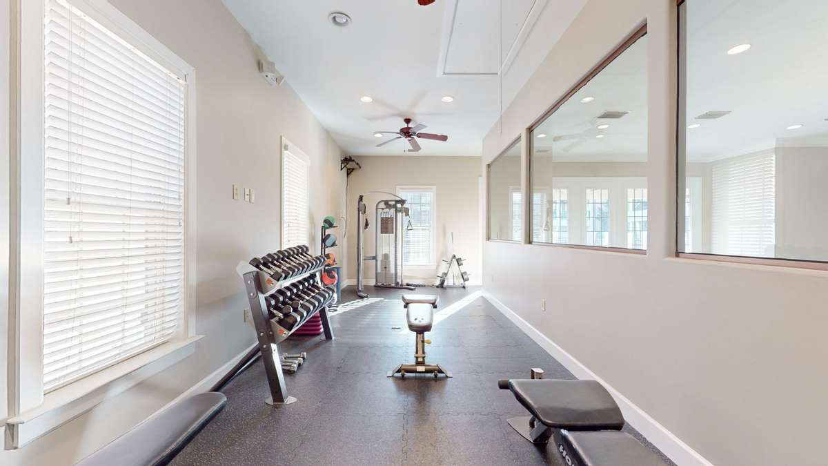 Workout studio includes free weights in the aerobic area and a dedicated cardio section.