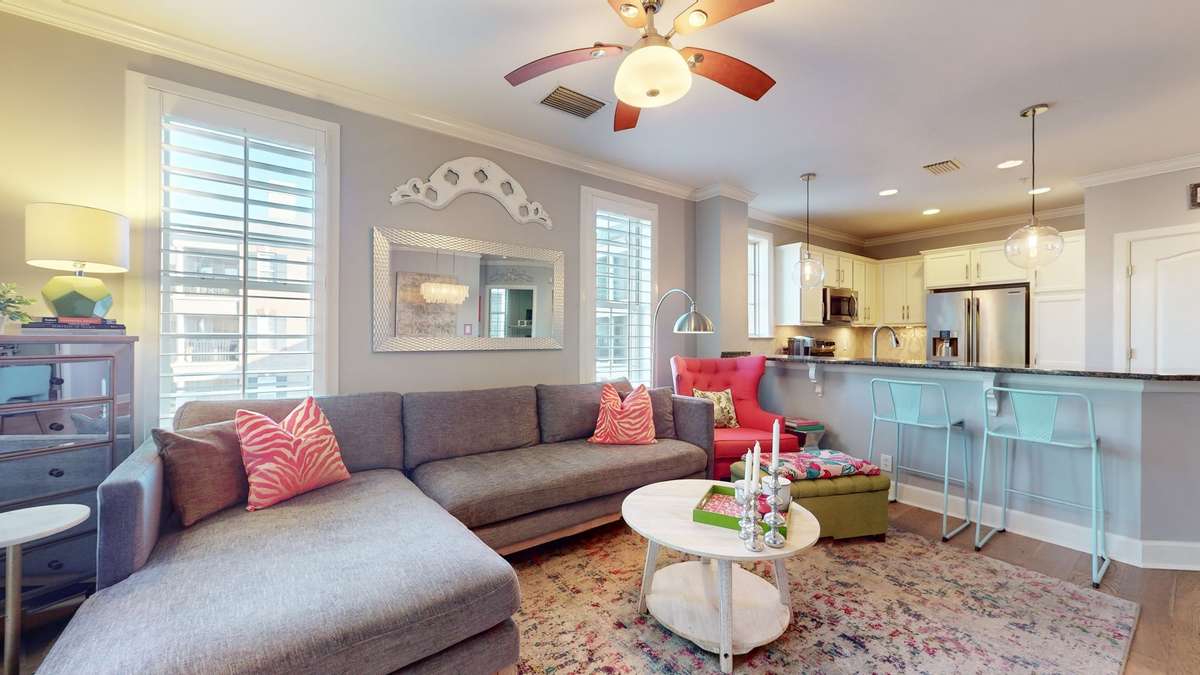 Plantation shutters and abundant natural light add to the charm